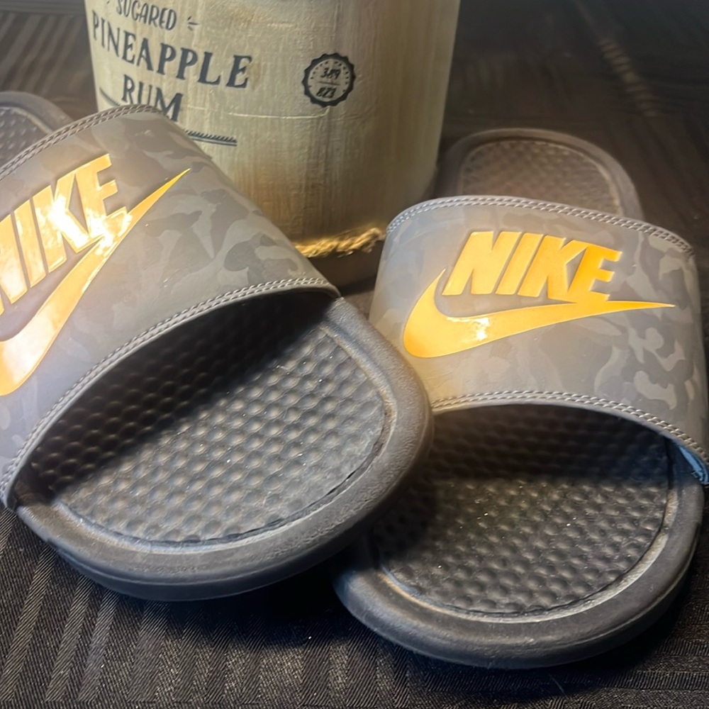 Black men’s Nike slides , size 9 , New.